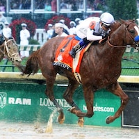 Justify wins the Kentucky Derby. (Photo by Coady Photography)