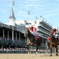 Cairo Cat (left) rallies to defeat Tight Ten in the Iroquois Stakes (gr. III) at Churchill Downs - Coady Photography