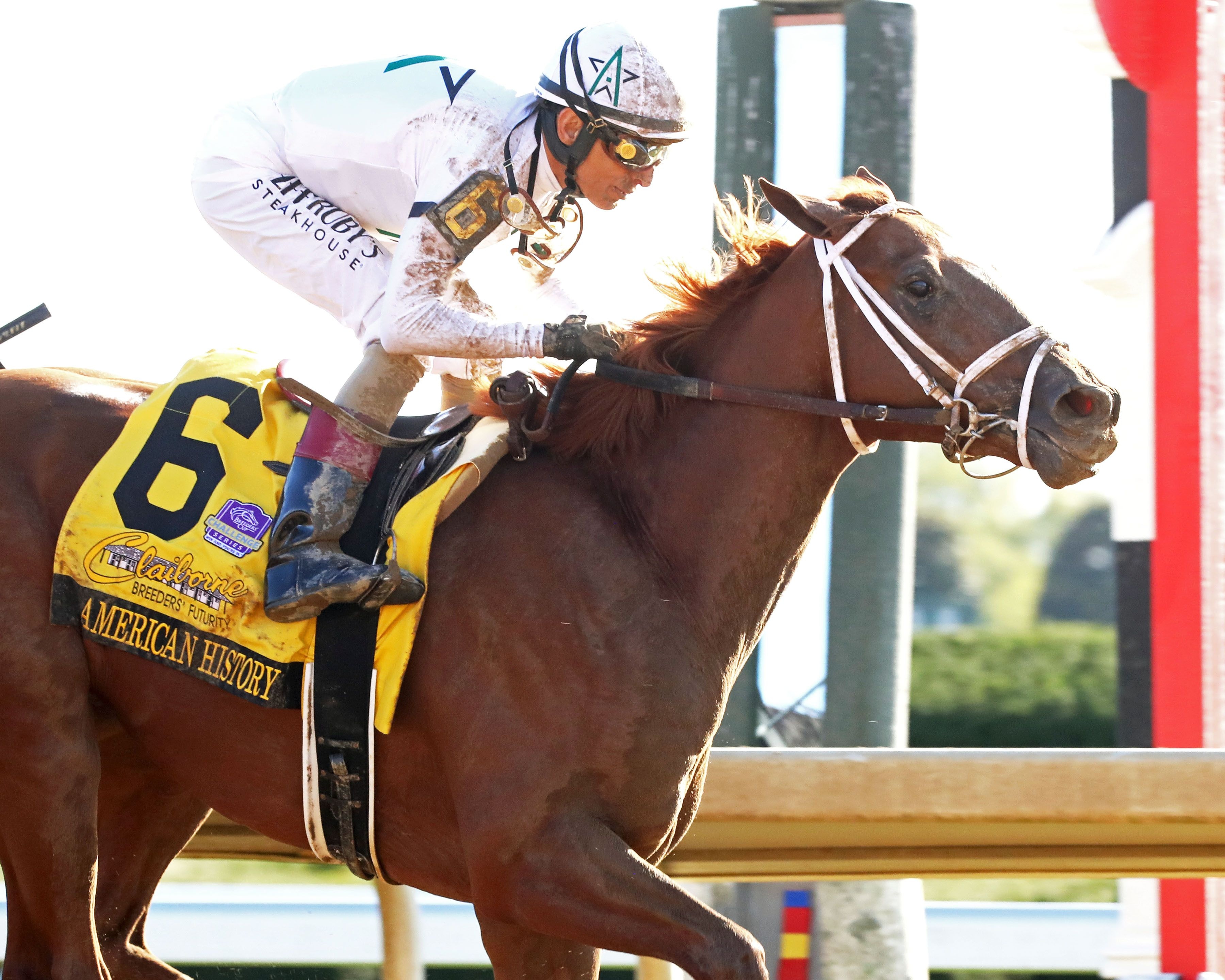 American History wins the Breeders' Futurity (G1) at Keeneland.