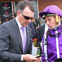 Trainer Aidan O'Brien (left) and jockey Ryan Moore at the Curragh in Ireland.