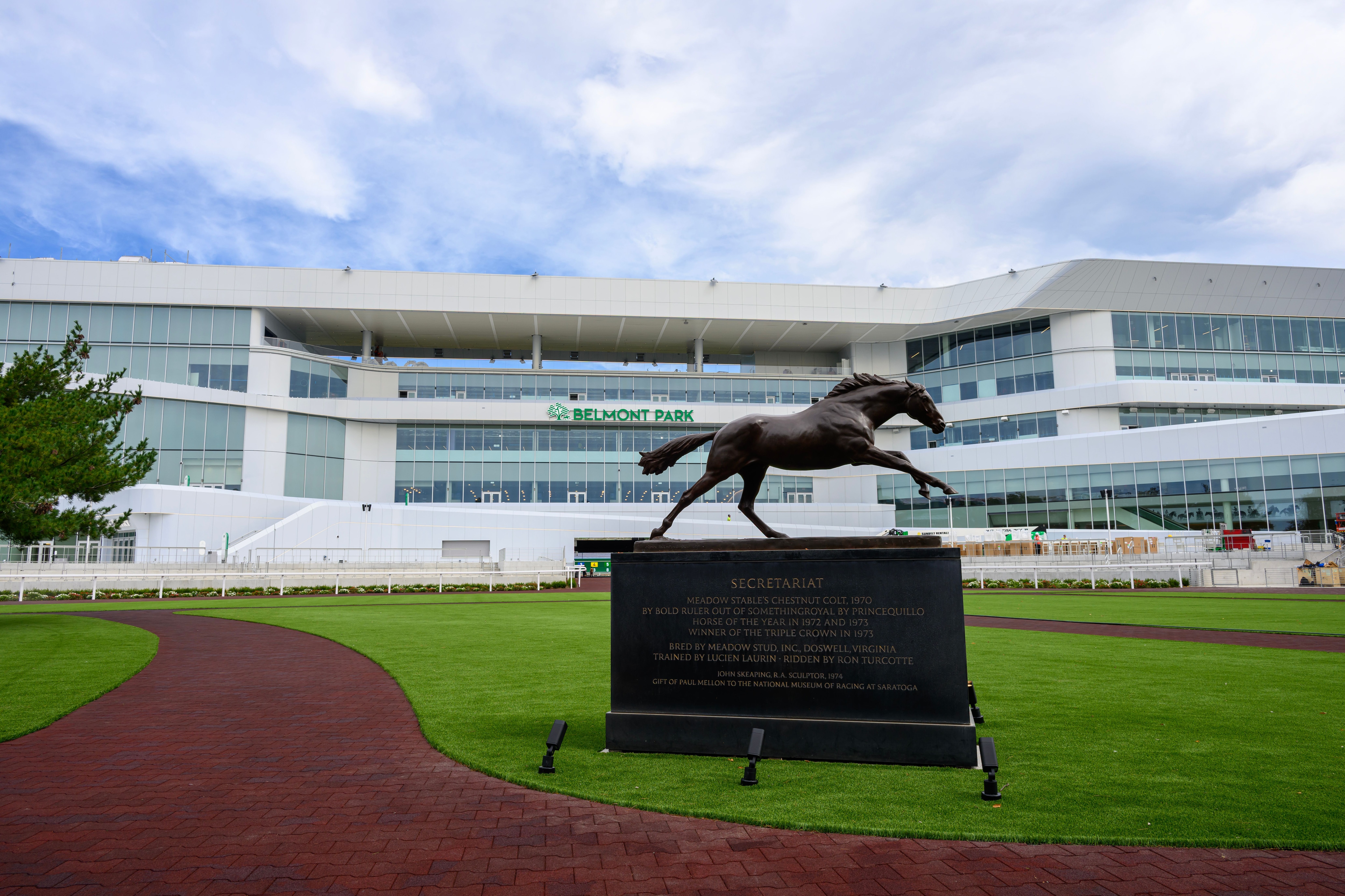 The Secretariat statue with the new Belmont Park grandstand