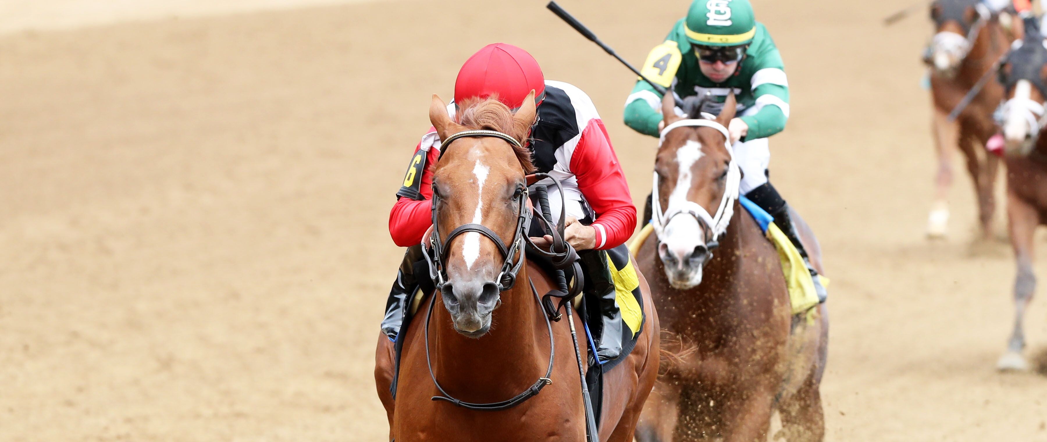 Comport wins at Churchill Downs.