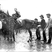 Clyde Van Dusen wins the 1929 Kentucky Derby (Photo courtesy of the Kentucky Derby Museum)
