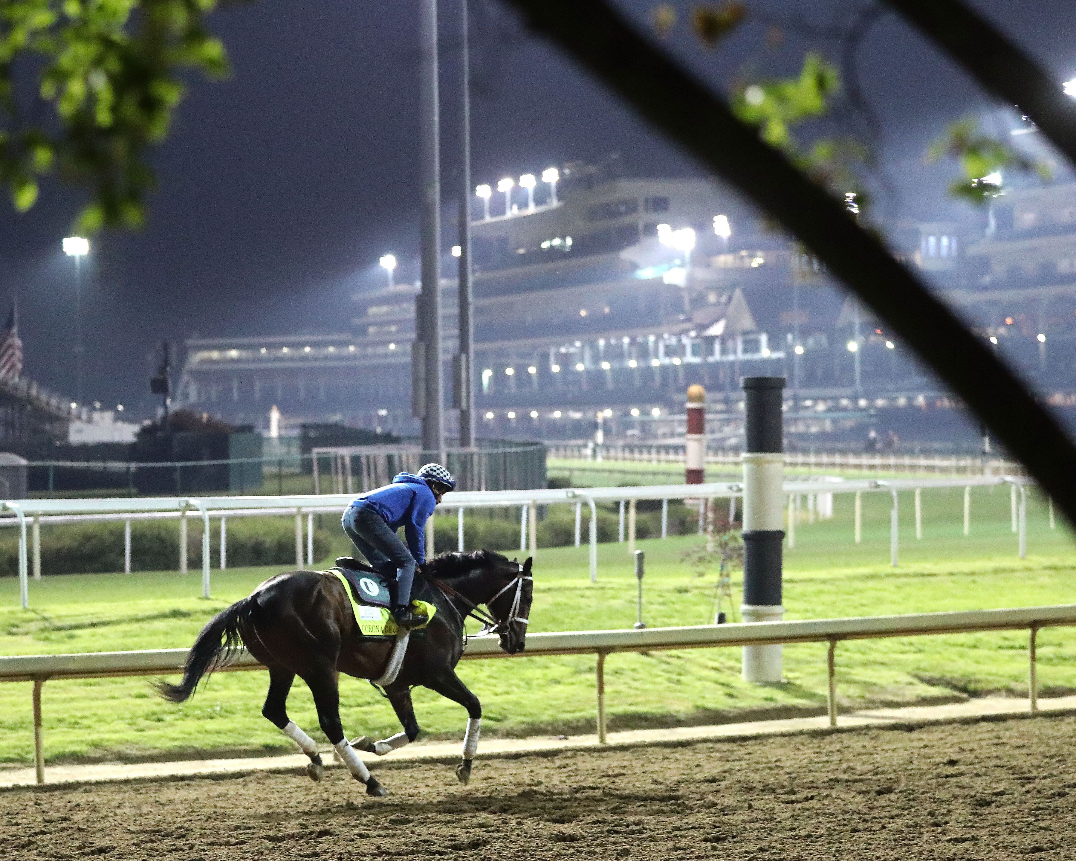 Corona de Oro galloping at Churchill Downs