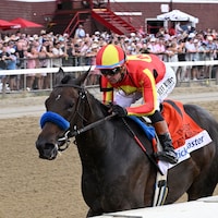 Explora wins the Test Stakes at Saratoga.