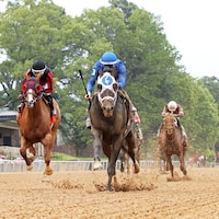 First Mission wins the Oaklawn Handicap at Oaklawn Park.