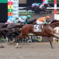Journalism wins the Haskell at Monmouth Park. 