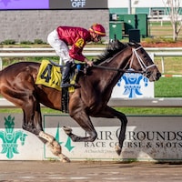 Just a Touch winning his debut at Fair Grounds (Photo by Hodges Photography)