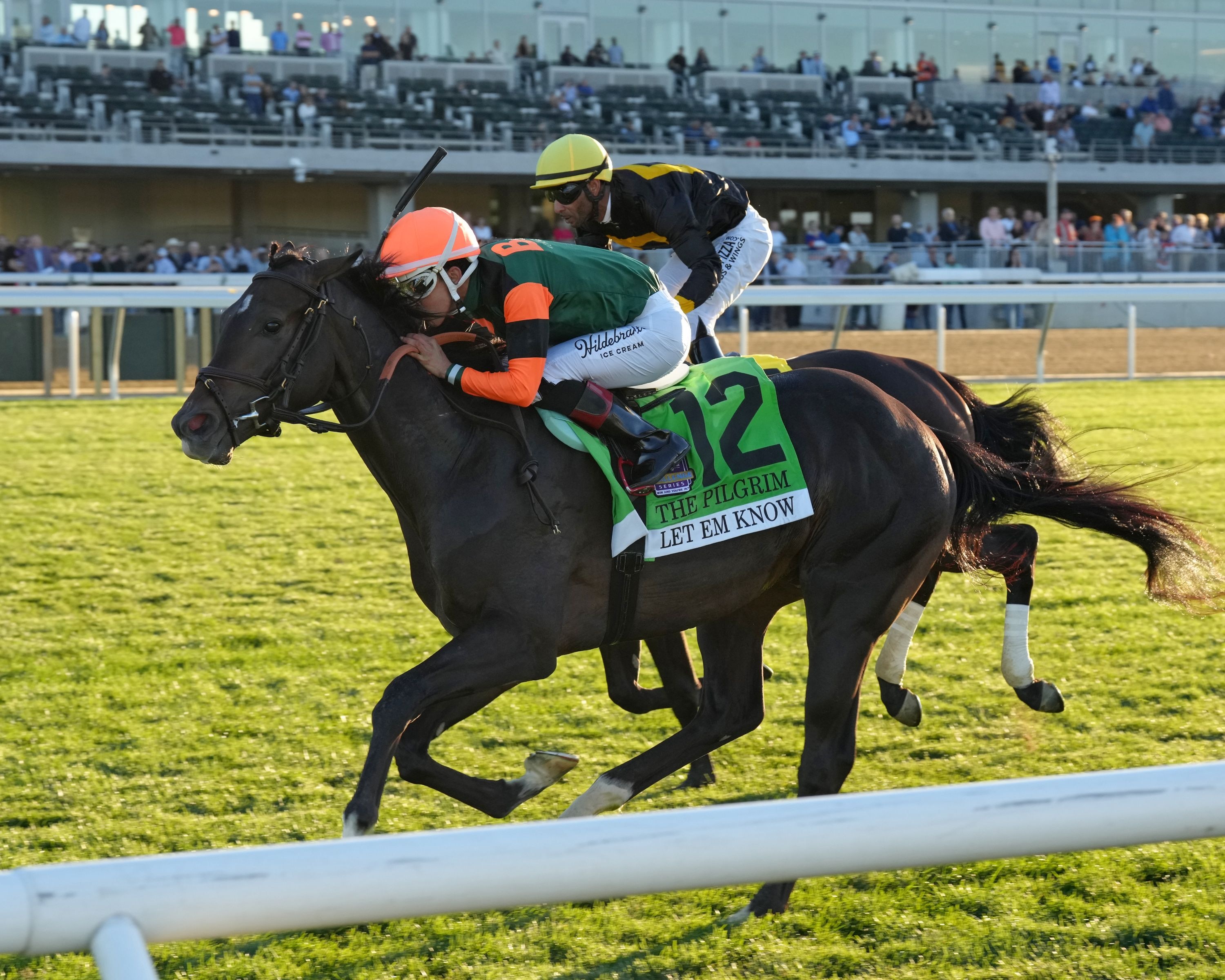Let Em Know wins the 2026 Pilgrim (G2) at Belmont Park.