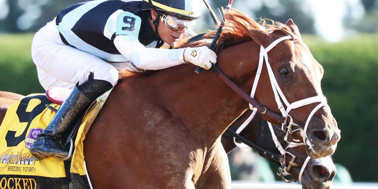 Locked winning the Breeders' Futurity (G1) at Keeneland (Photo by Coady Photography/John Gallagher)