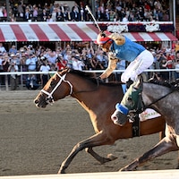 Leading Change wins the Travers Stakes at Saratoga.