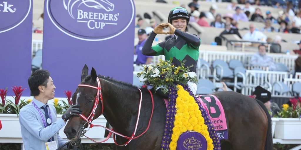 Loves Only You in the winner's circle after the Breeders' Cup Filly & Mare Turf
