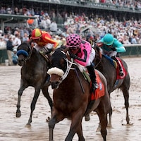 Macho Music winning the Pat Day Mile (G2) at Churchill Downs