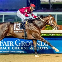 Magnitude wins the Risen Star at Fair Grounds.