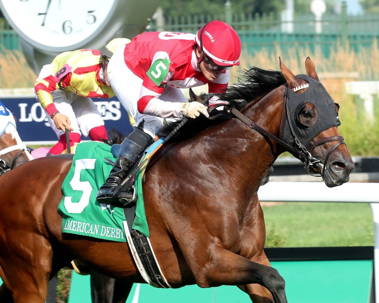 Minaret Station wins the American Derby at Churchill Downs.
