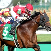 Minaret Station wins the American Derby at Churchill Downs.