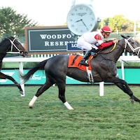 Movin' On Up wins at Churchill Downs.