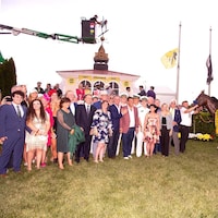 National Treasure and connections in the winner's circle of the Preakness Stakes
