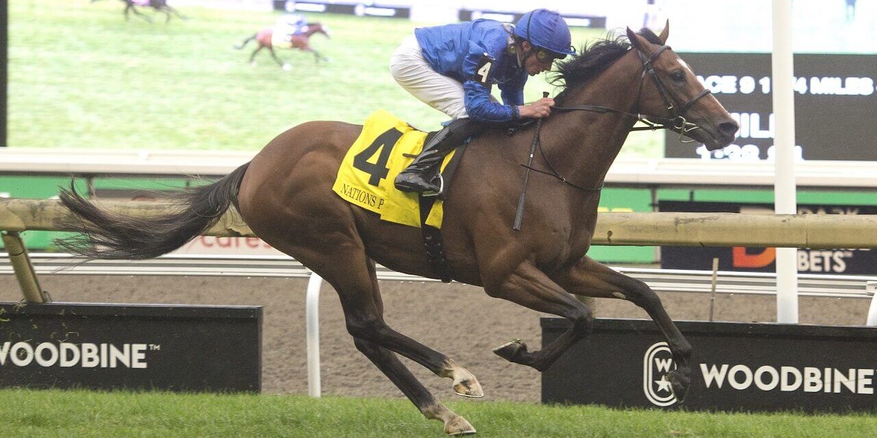 Nations Pride winning the Canadian International (G2) at Woodbine (Photo by Michael Burns Photography)