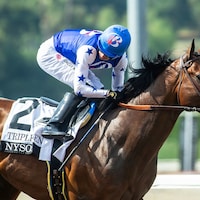 Juan Hernandez looks for competition aboard Nysos in the Triple Bend
