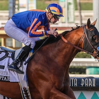 Plutarch wins the Robert B. Lewis at Santa Anita. 
