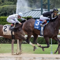R Disaster wins at Saratoga.