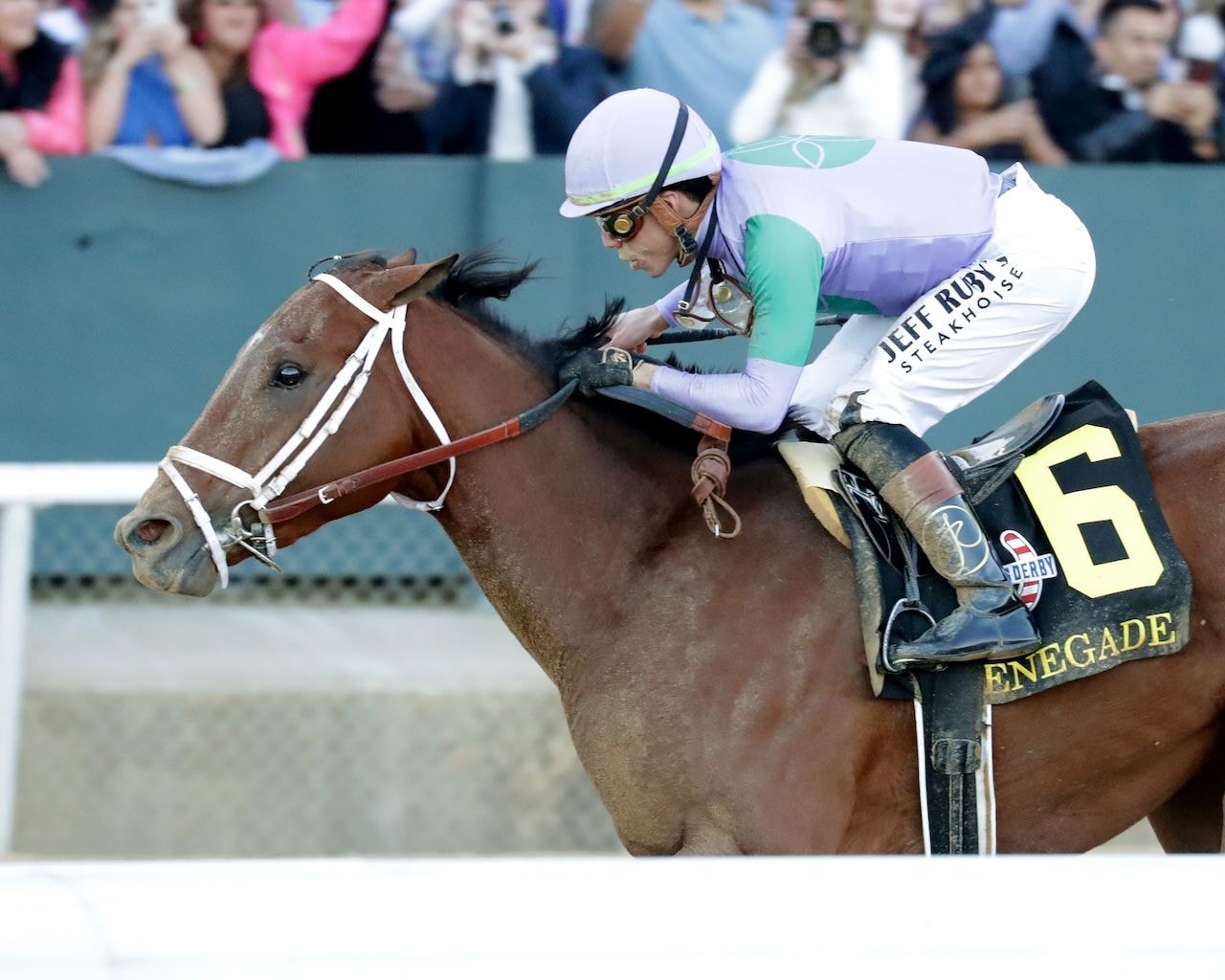 Renegade wins the Arkansas Derby at Oaklawn Park.