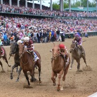 Rich Strike with Sonny Leon aboard wins the 148th Kentucky Derby at Churchill Downs