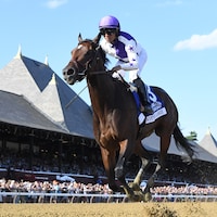 Scottish Lassie wins the Coaching Club American Oaks at Saratoga.