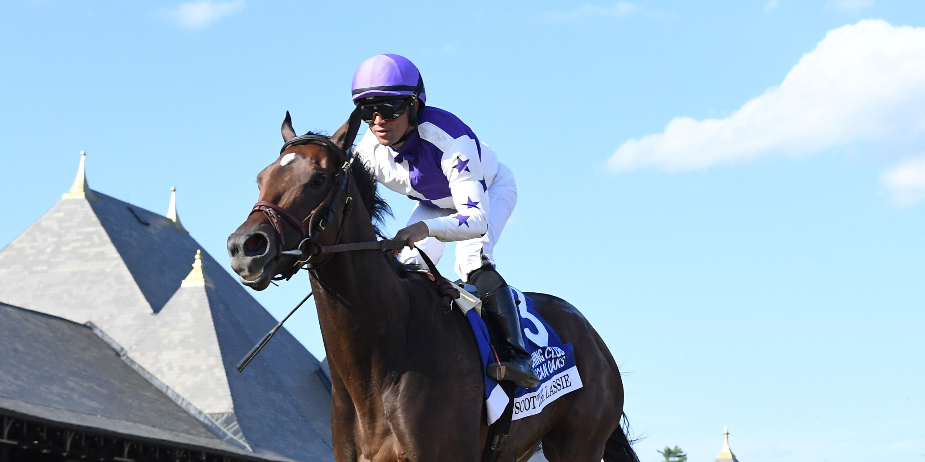 Scottish Lassie wins the Coaching Club American Oaks at Saratoga.