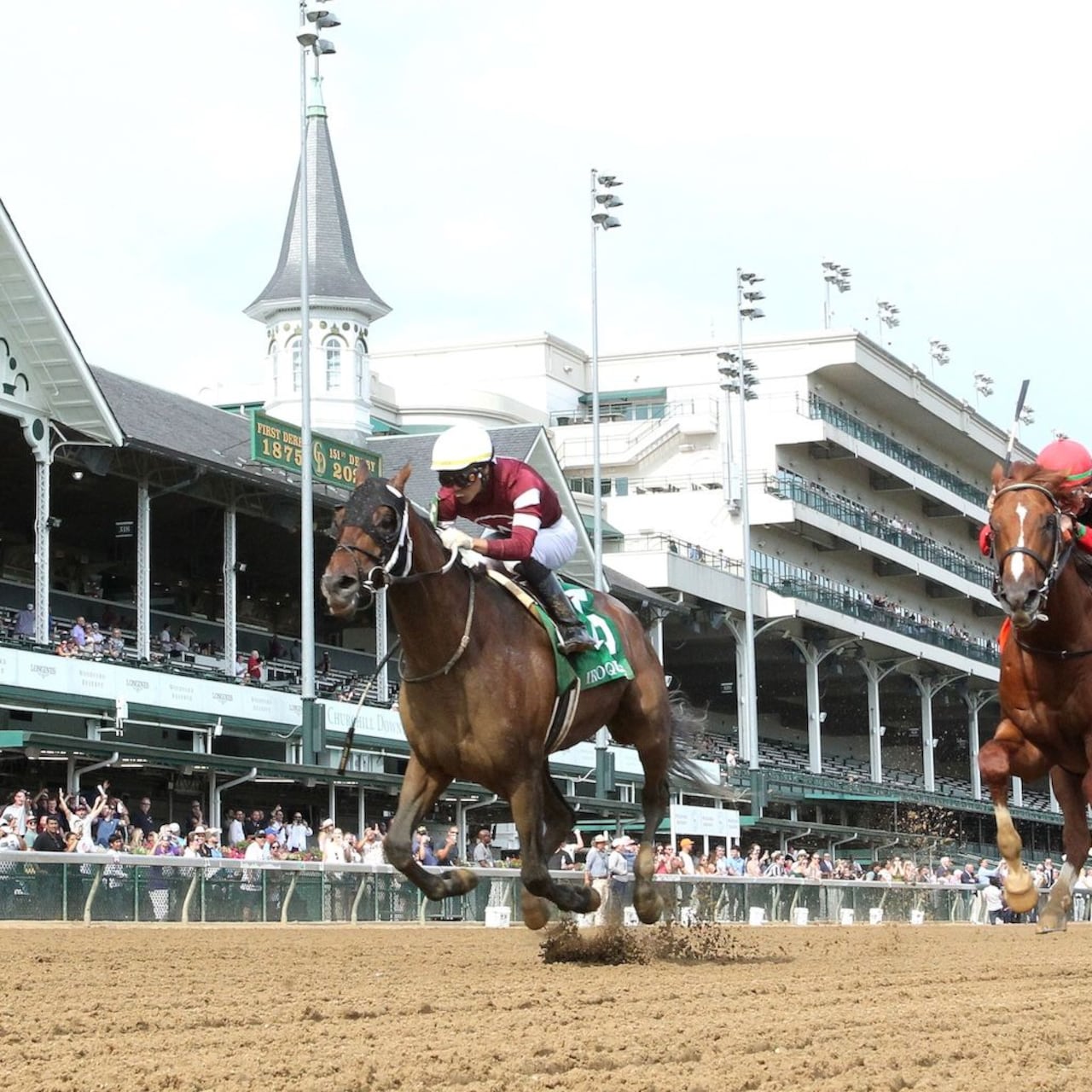 Spice Runner (outside) wins the Iroquois (G3) at Churchill Downs.