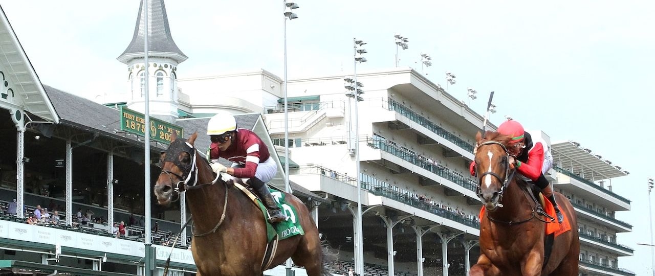 Spice Runner (outside) wins the Iroquois (G3) at Churchill Downs.