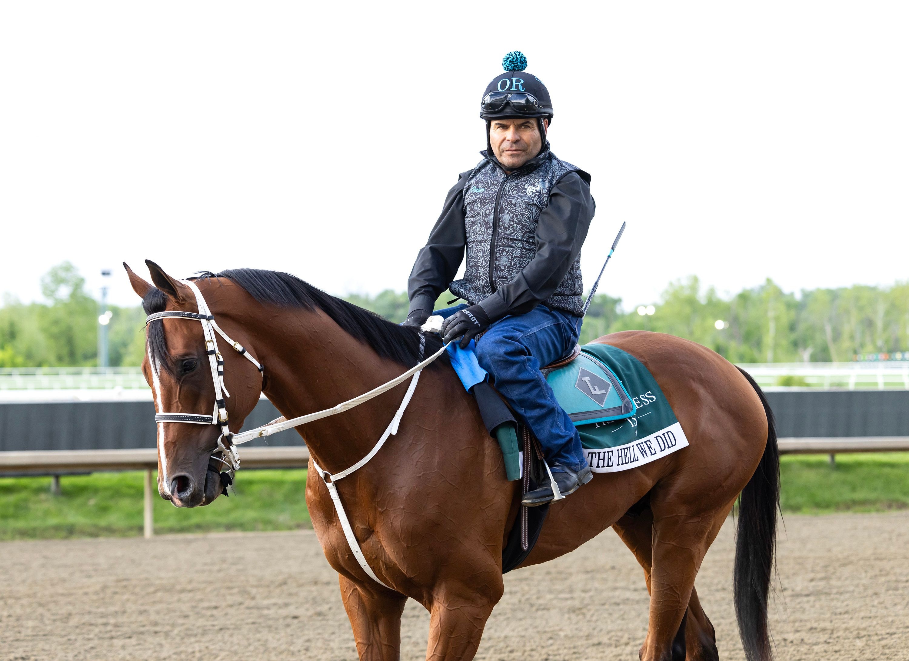 The Hell We Did trains towards the Preakness Stakes (Photo by Equi-Photo)