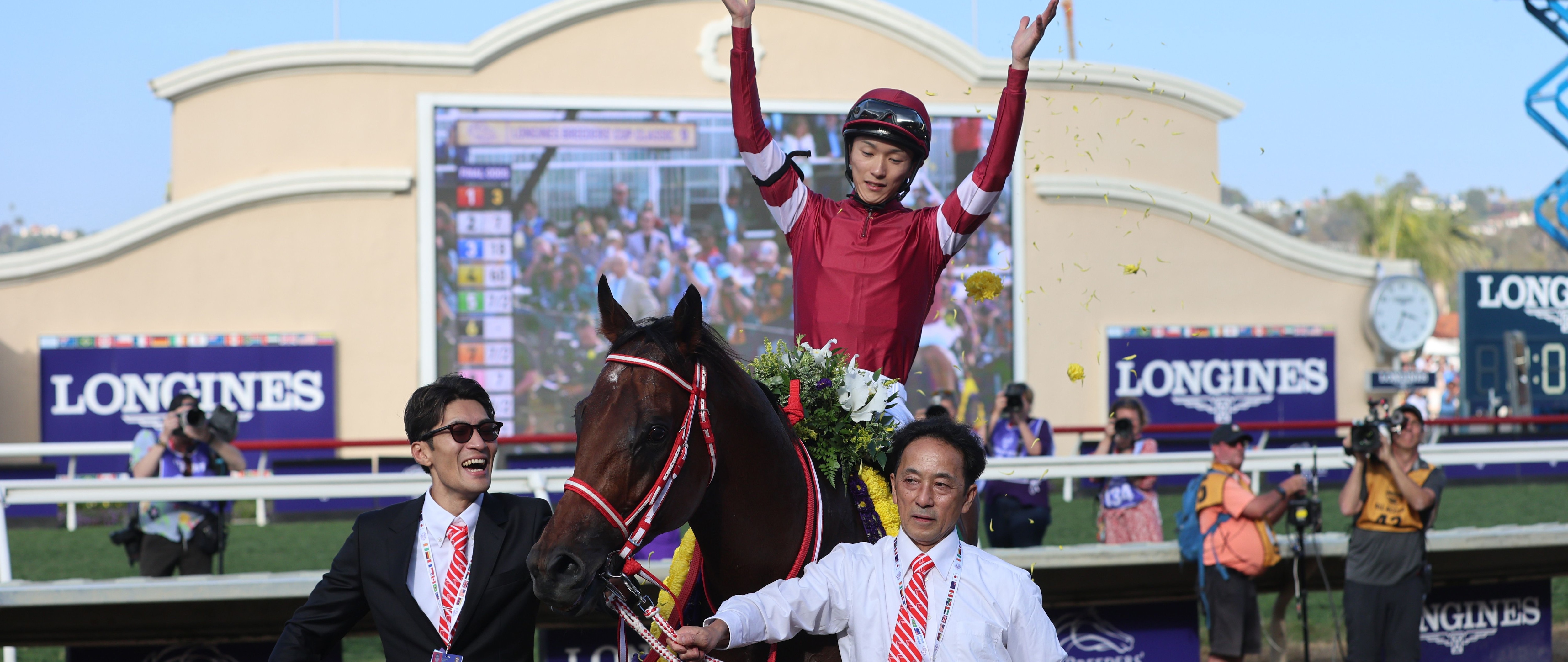 Forever Young's jockey, Ryusei Sakai, celebrates Japan's first Breeders' Cup Classic (G1) victory