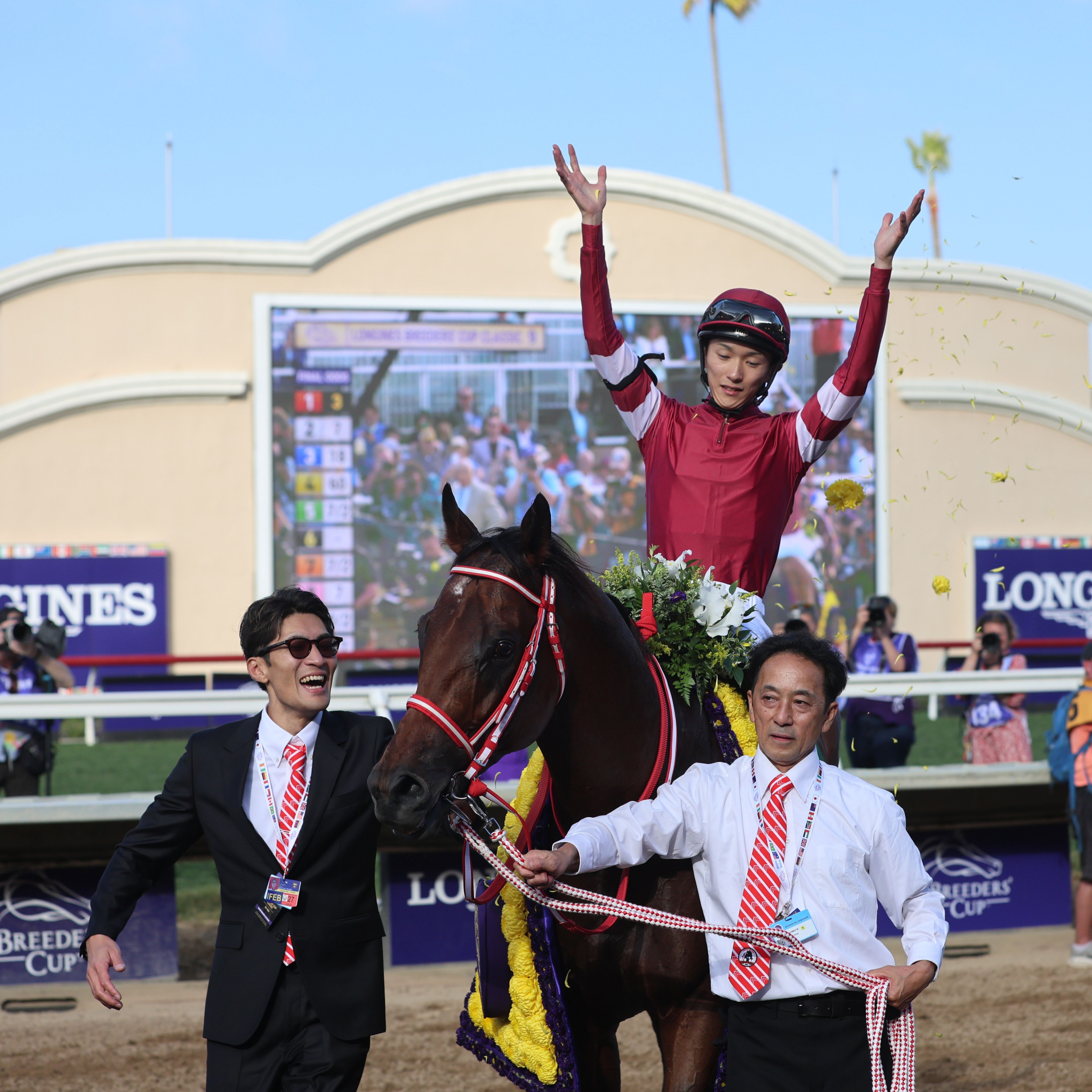 Forever Young's jockey, Ryusei Sakai, celebrates Japan's first Breeders' Cup Classic (G1) victory