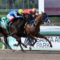Imagination winning the San Felipe (G2) at Santa Anita (Photo by Horsephotos.com)