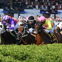 John the Beer Man (right) outduels Doncho (center) and Waralo in the Troy (G2)
