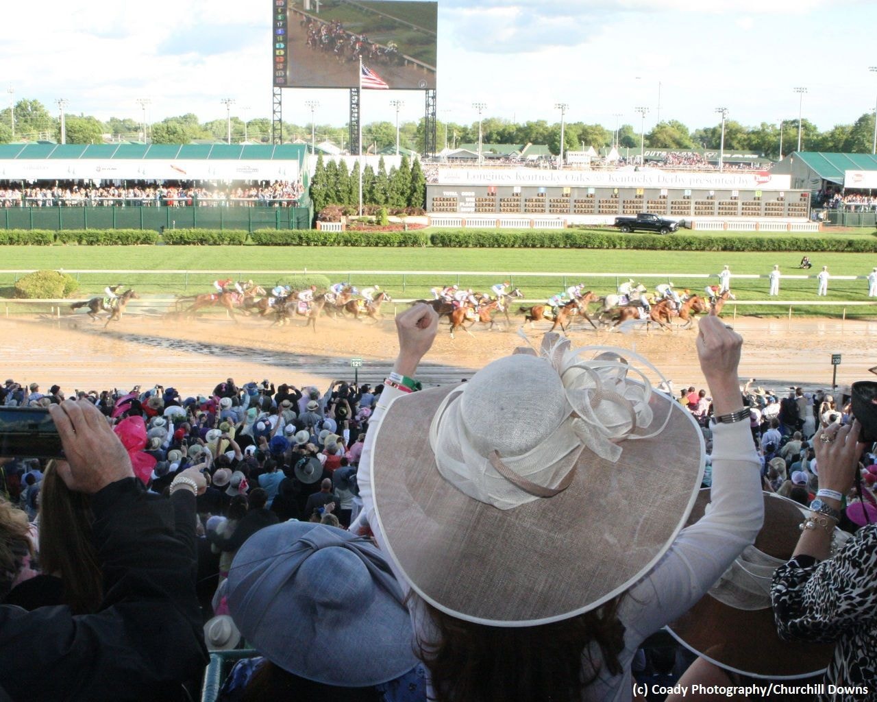 Fans cheer at Churchill Downs
